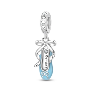 Detail of ballet shoe charm with blue enamel, bow accents and Dancing engraving
