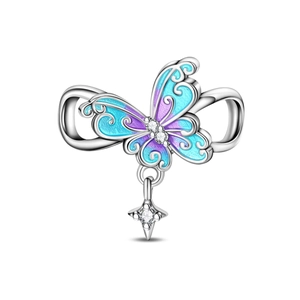 Abalorio de mariposa detallado con esmalte azul púrpura e incrustación de circonitas