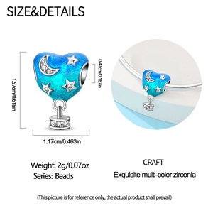 Detailed blue gradient heart bead charm with silver moon and star zircon patterns