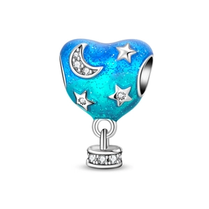 Close-up of hot air balloon charm with blue enamel, stars and sparkling cubic zirconia