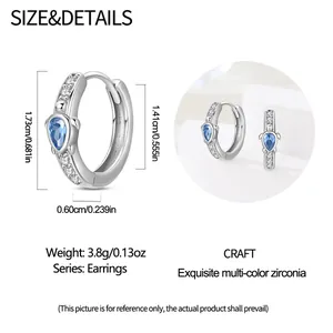 Size specifications and details for silver hoop earrings with blue teardrop zircon stones