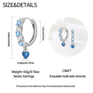 Detail view of heart-shaped silver earrings with blue zirconia and specific dimensions