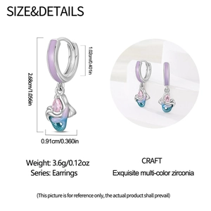 Detail view of mermaid tail earrings with blue enamel and pink zircon stone measurements