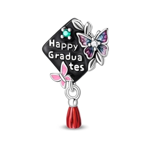 Detail of owl graduation cap charm with butterfly patterns and Happy Graduates text