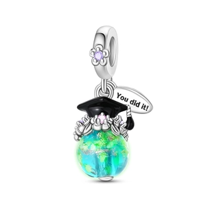 Detail of owl charm with graduation cap, colorful globe bead and You Did It tag