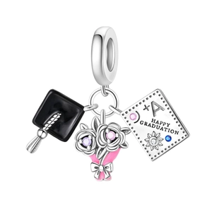 Silver graduation owl charm with black doctoral cap and a happy graduation tag