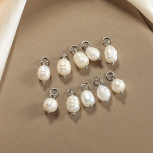 Set of ten irregular baroque freshwater pearl pendants with silver jump rings for DIY jewelry
