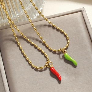 Gold beaded chain necklaces with vibrant red and green enamel chili pepper pendants