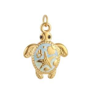 Macro detail of gold-plated sea turtle pendant with light blue enamel and starfish relief