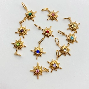 Set di 10 ciondoli a stella dorati con gemme colorate per la creazione di gioielli DIY