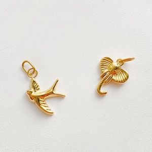 Polished gold stainless steel charms in bird and elephant shapes for DIY jewelry making