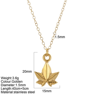 Golden maple leaf pendant necklace in stainless steel with detailed leaf texture