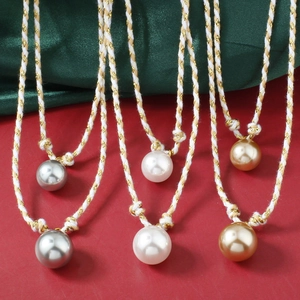 Minimalist pearl pendant necklaces in white gray and champagne on woven rope cord