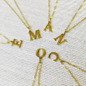 Golden 26 initial letter necklaces in stainless steel with elegant cross chains