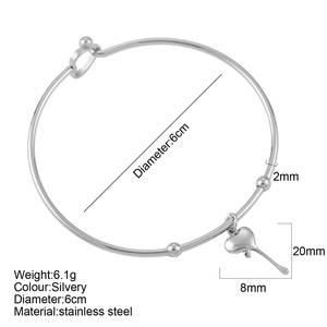 Zilveren roestvrijstalen armband met hartvormige hanger en 6cm diameter ring
