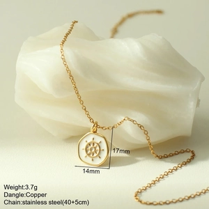 Detail view of gold enamel helm pendant on stainless steel chain with size specs