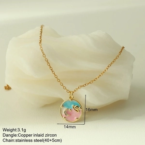 Detail of bohemian moon and star enamel pendant on 14mm round stainless steel chain