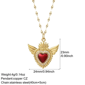 Detail view of red enamel heart wing pendant with CZ stones and product dimensions