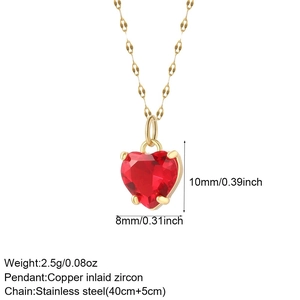 Macro shot of red heart pendant with gold stainless steel paperclip chain detail