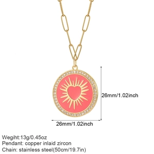 Detail of red heart sunburst pendant necklace with measurements and paperclip chain specs
