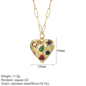 Detail view of heart pendant necklace with colorful cubic zirconia and paperclip chain