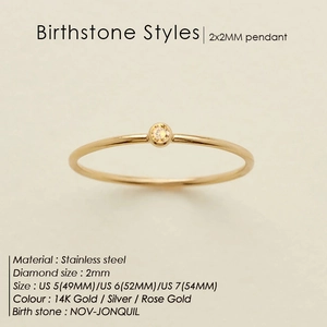 Minimalist 14K gold stainless steel ring with a 2mm yellow birthstone solitaire