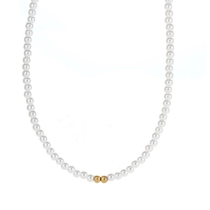 Minimalist pearl necklace with central gold beads on a clean white background