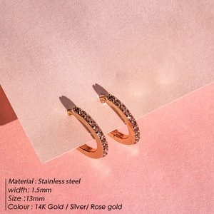 Detail of rose gold hoop earrings with inlaid pink zircon and 13mm inner diameter
