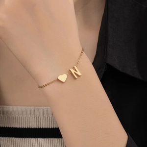 Minimalist gold stainless steel chain bracelet with heart and letter N charms for women