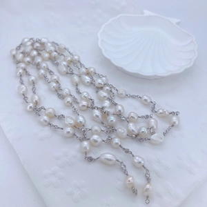 Elegant multi-layer baroque pearl long necklace with zircon studs and silver chain links