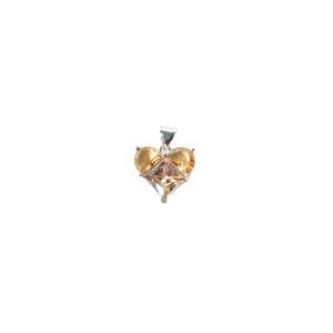 Champagne heart-shaped zircon pendant with silver-plated claw setting on white background