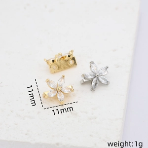 Close-up of 14k gold plated flower spacer bead with 11mm marquise zirconia petals