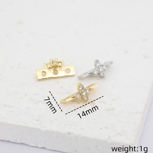 Detailed view of 14k gold-plated 14mm cubic zirconia spacer charms with dimensions