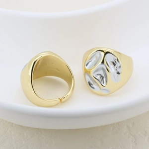 Exaggerated open gold ring with irregular silver texture and adjustable sizing