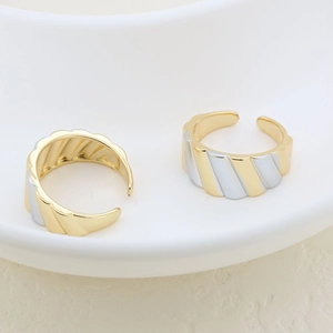 Irregular textured open ring set with dual-tone 18K gold and silver plating