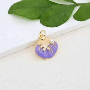 Detail of seashell charm with purple enamel, white pearl and golden starfish
