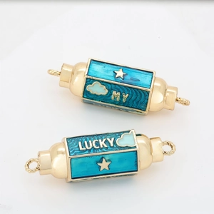 Detail of gold-plated hexagonal connectors with blue enamel and MY LUCKY inscription