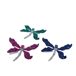 Dragonfly brooch set with inlaid colored cubic zirconia stones on silver metal base