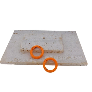 Set of two orange round spring rings made of painted copper for DIY jewelry making