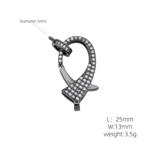Macro detail of gunmetal black lobster clasp with micro-paved cubic zirconia crystals