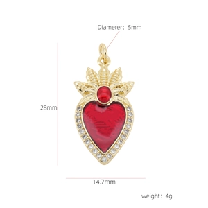 Gold plated 18k heart pendant with large red gemstone and white zircon crown detailing