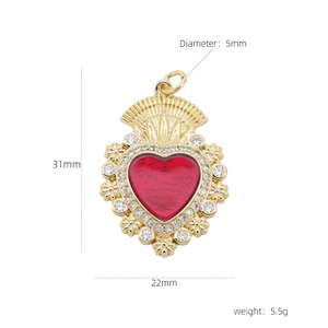 Macro detail of red heart pendant with white zircons and dimensions 31mm x 22mm
