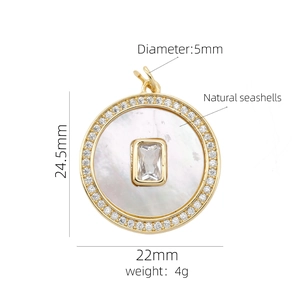 Detail view of 18K gold heart pendant with natural mother of pearl and zircon stones