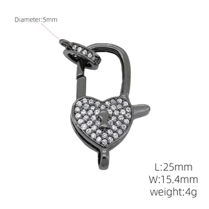 Macro detail of gunmetal heart clasp with micro-paved zircons showing 25mm length dimensions