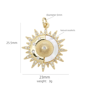 Macro view of 18K gold sun pendant with shell inlay and detailed product dimensions