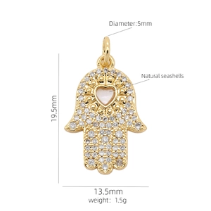 Detailed dimensions of 18K gold Hamsa hand pendant with heart shell and pavé crystals