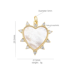 18K gold heart pendant with natural seashell and zircon crystals on white background