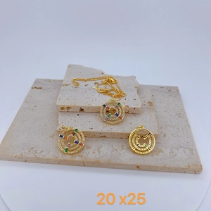 Macro view of gold-plated hollow geometric pendant with micro-set cubic zirconia crystals