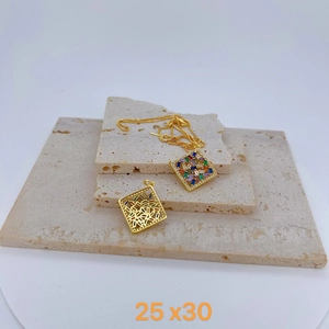Detailed view of gold rectangle pendant with colorful zircon stones measuring 25x30mm