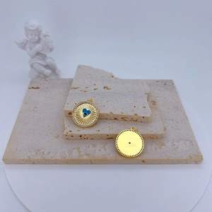 Gold plated evil eye round pendant necklace with blue heart zircon and radial patterns